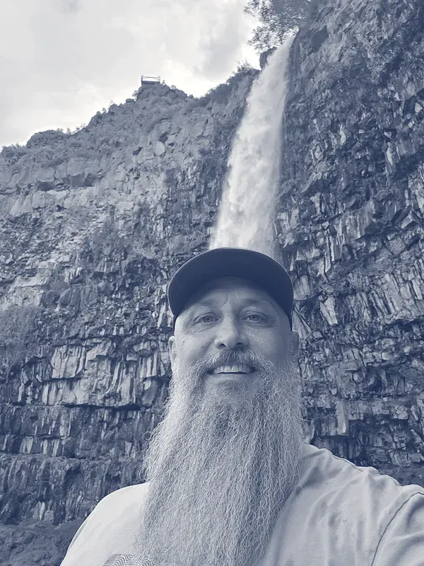Josh Hiedeman at a waterfall in Idaho